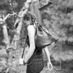 1 of 1 Luna Crossbody Adjustable Cinch Top Leather Backpack | swallowtail black image 8