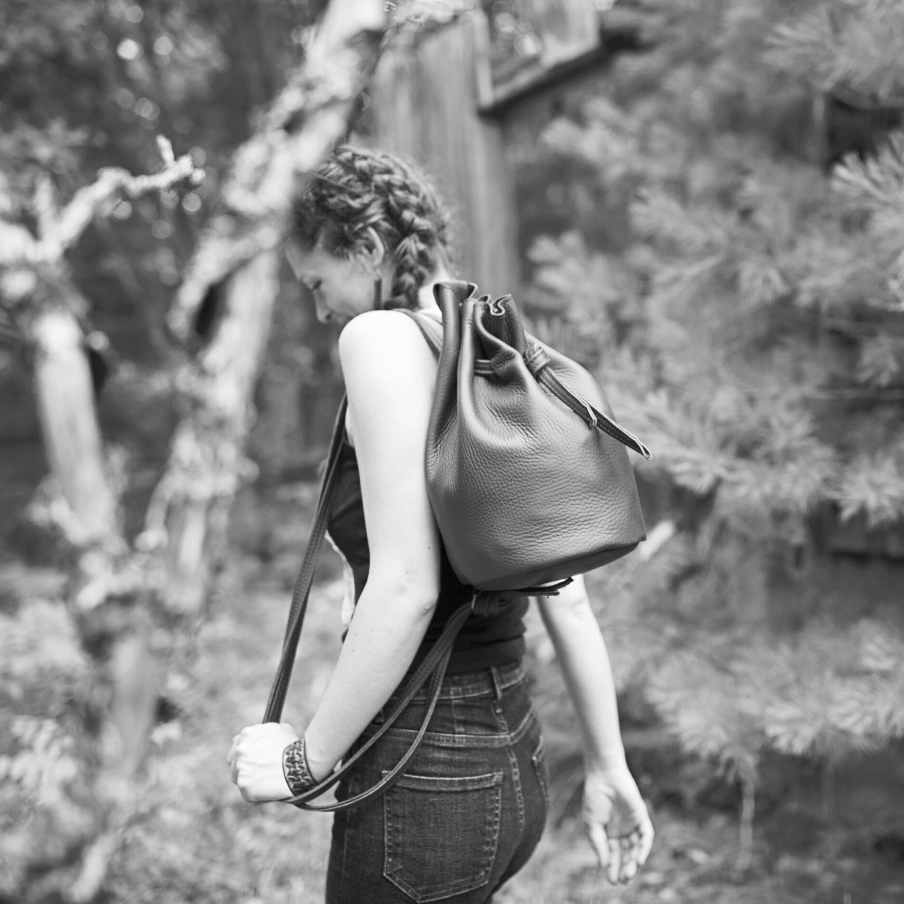 1 of 1 Luna Crossbody Adjustable Cinch Top Leather Backpack | swallowtail black image 8