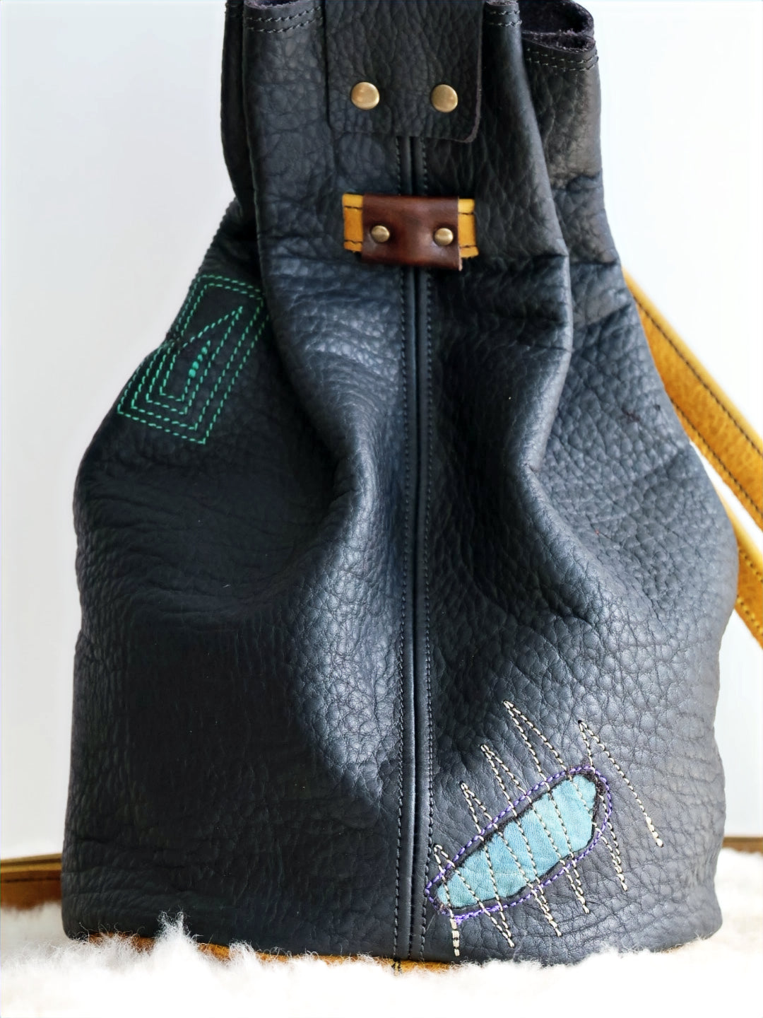 1 of 1 Luna Crossbody Adjustable Cinch Top Leather Backpack | swallowtail black image 2