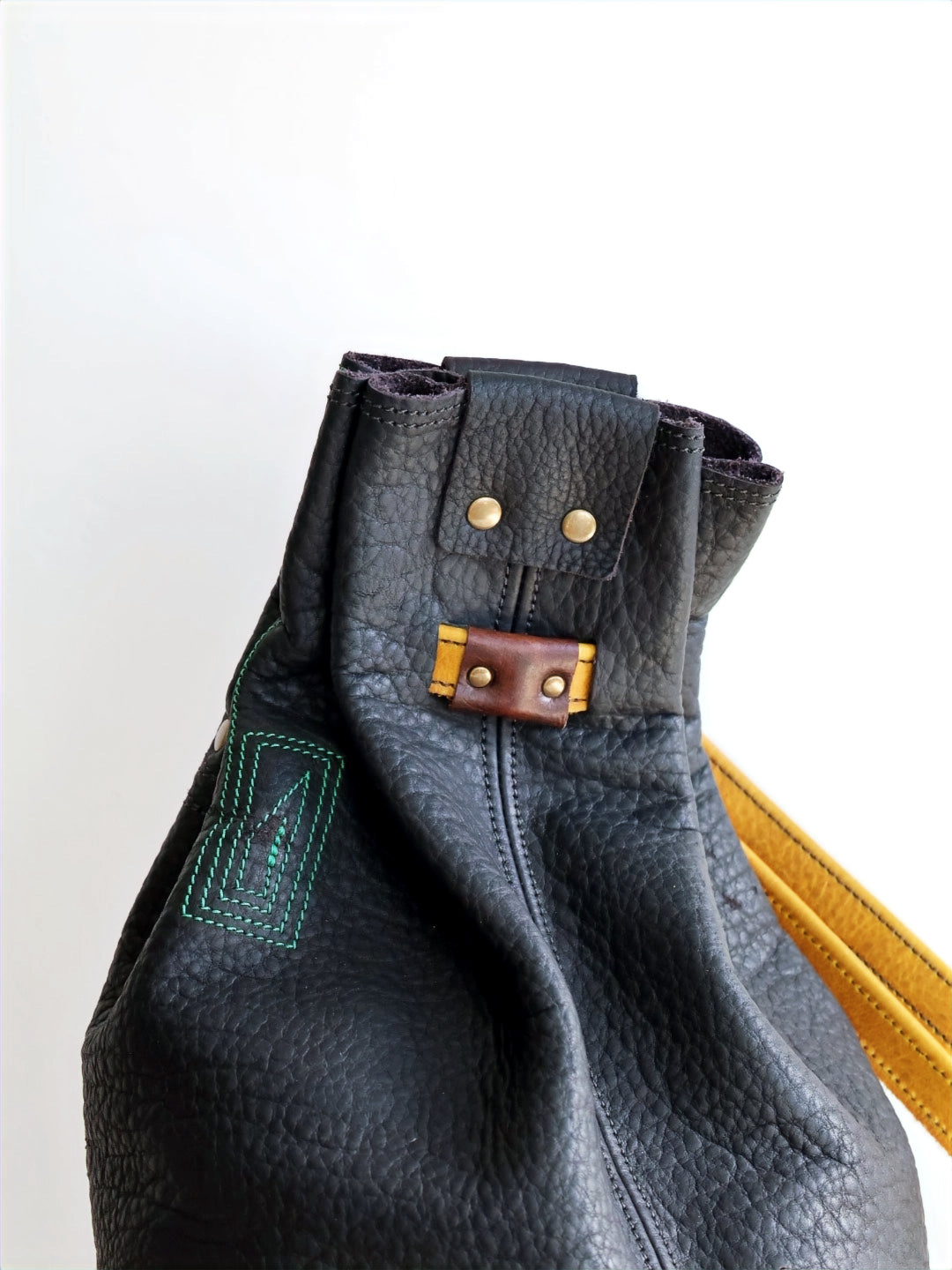 1 of 1 Luna Crossbody Adjustable Cinch Top Leather Backpack | swallowtail black image 4